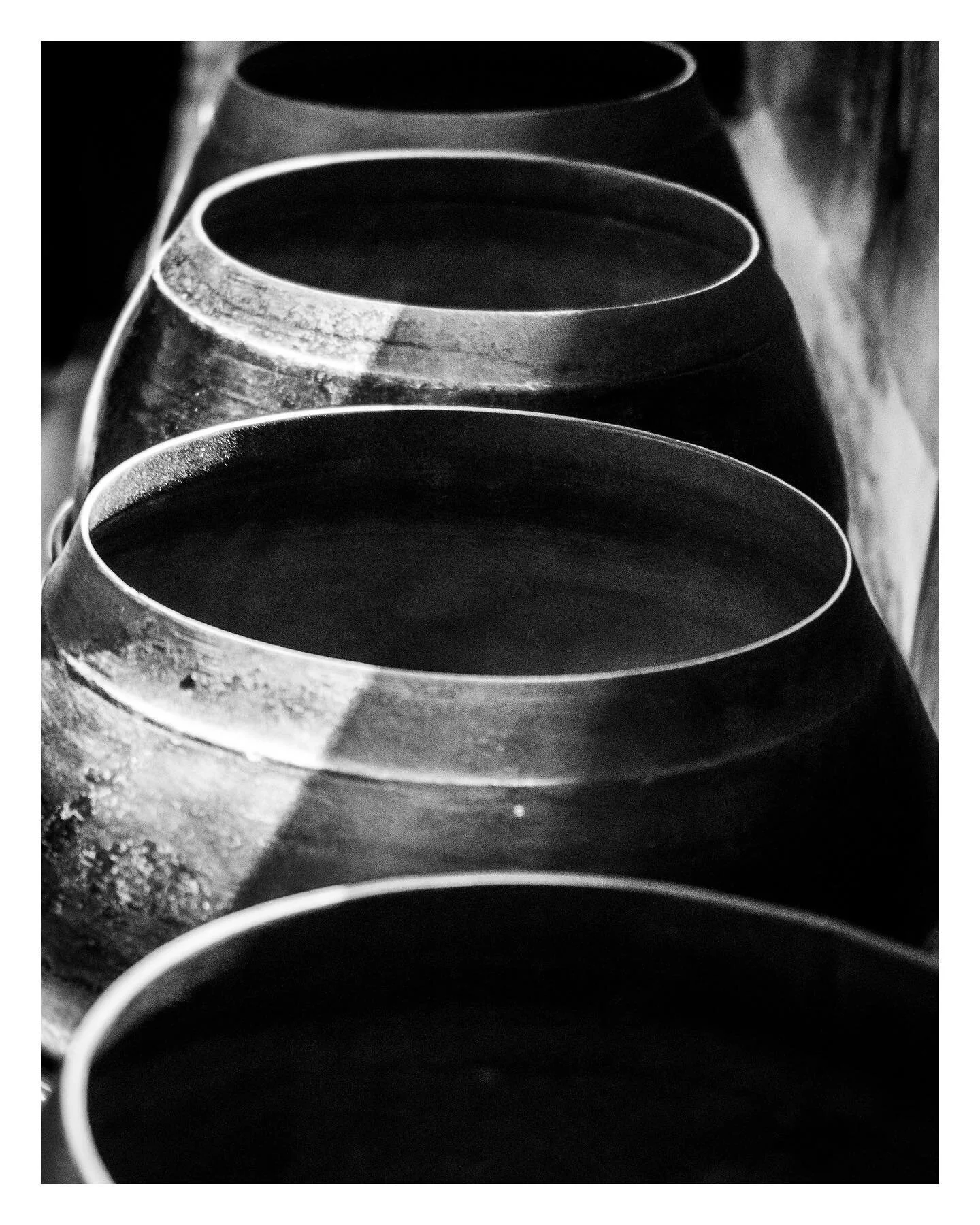 Prayer Pots - in the Temple of the Reclining Buddha (Wat Pho), Bangkok - Devout Buddhists place good coins in 108 prayer pots in the belief that their wishes will be granted. 108 is significant as referring to the 108 positive actions and symbols tha