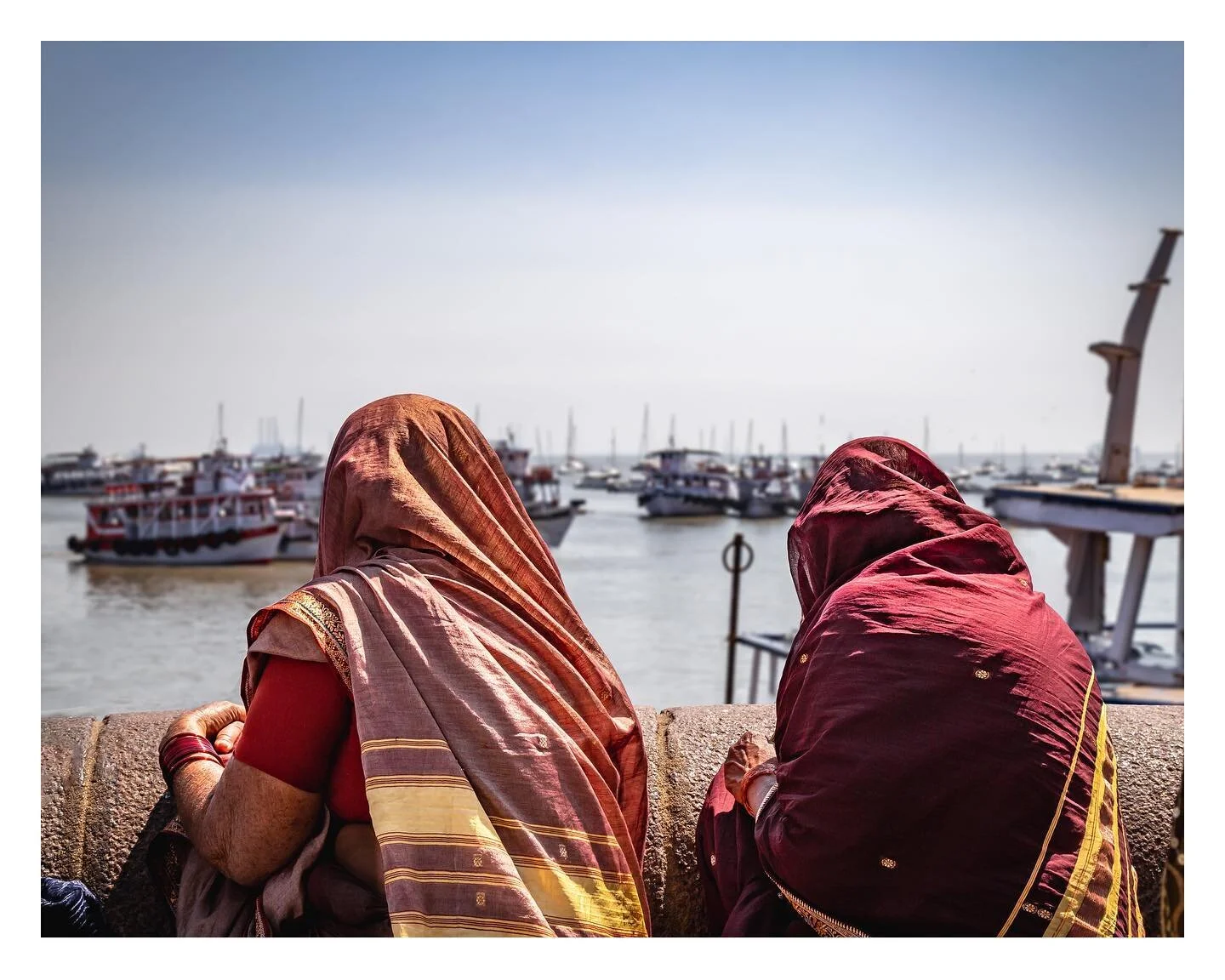Looking out to Sea - Two ladies looking out into the Arabian Sea from the shores of Mumbai, India. I love Mumbai, mainly as there is nothing massively touristy to do. Just great food, great people and an amazingly busy city! 

#amateurphotography #am