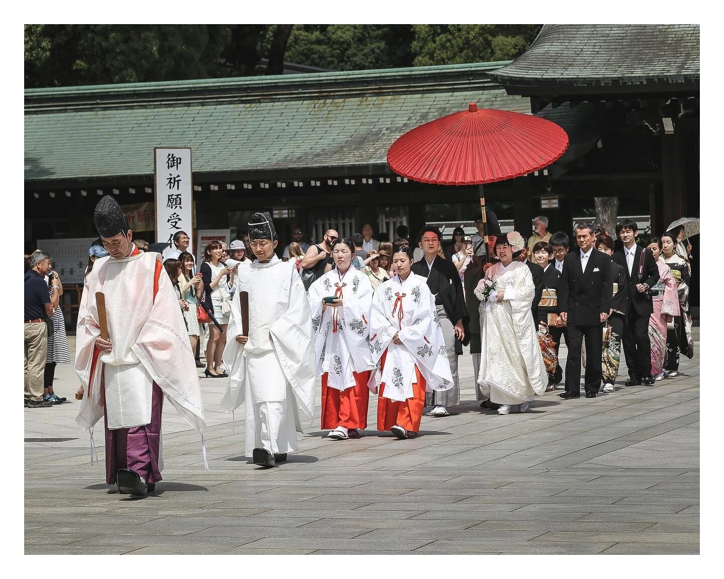 Traditional Japanese Wedding - Whilst exploring the Meiji-Jingu Shrine in Tokyo, we were lucky enough to witness this traditional Japanese wedding. The most striking element for me was the monochrome nature of the wedding outfits with the exception o