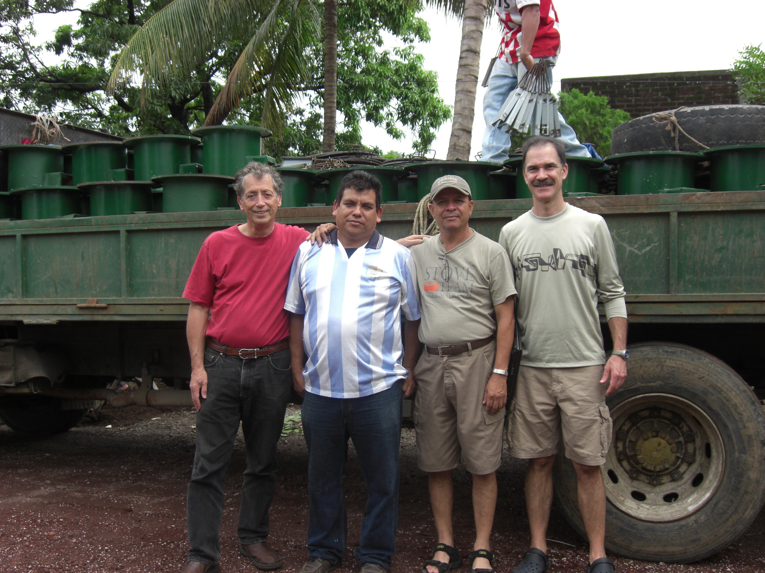 Gerry Reicher, Jay Lamb, Gustavo Pena and AHDESCO agent picking up stoves.jpg