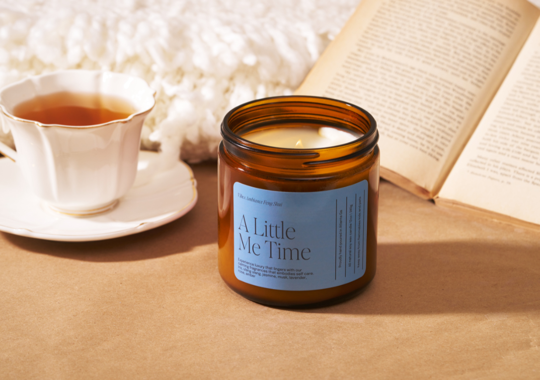 A little me time candle with a cup of tea