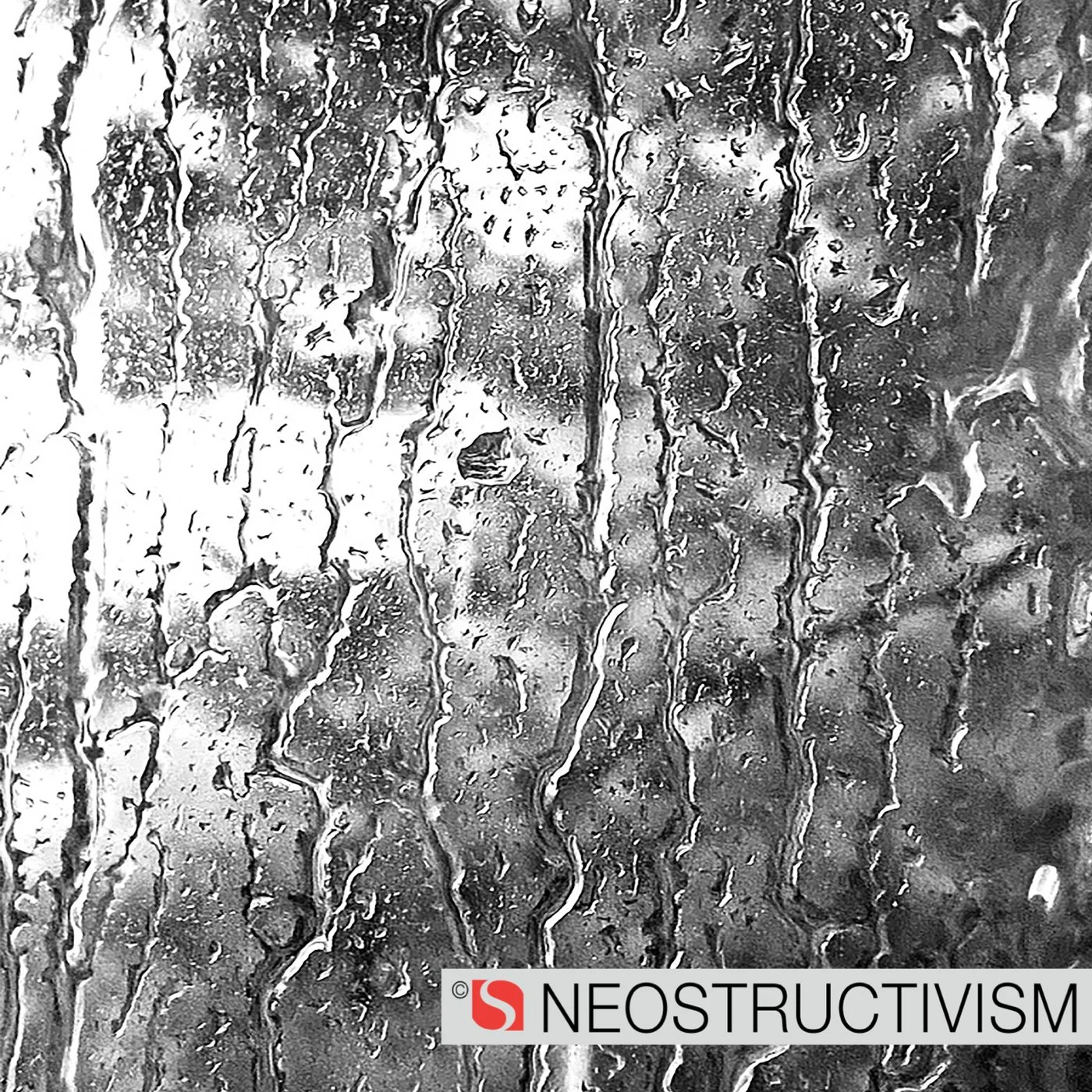 black and white rain drops on a window