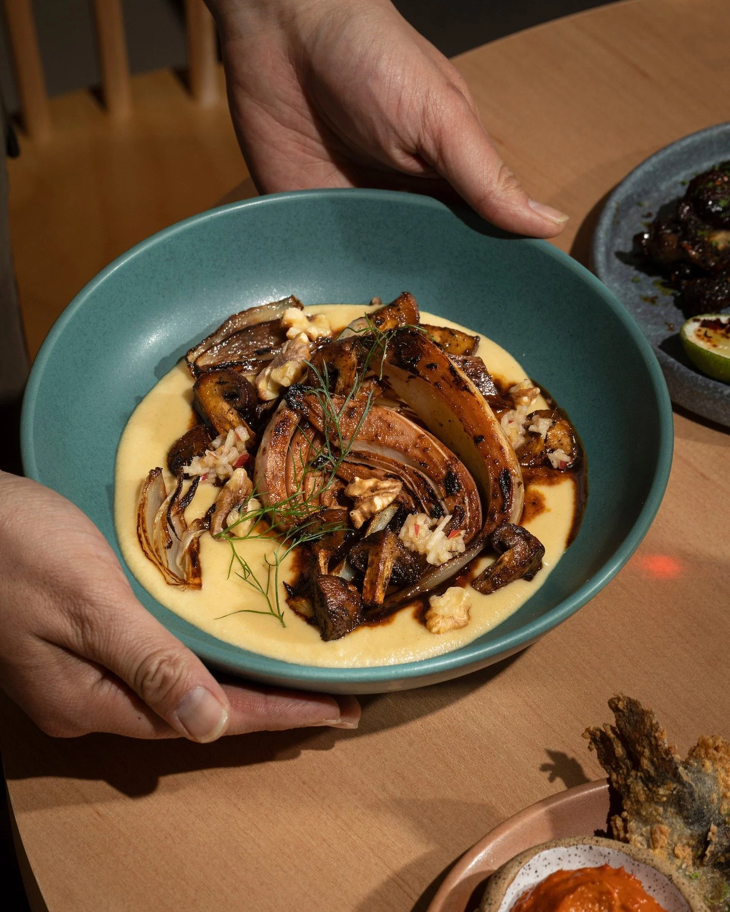 Welcoming ✨Suya Fennel✨ to our dinner lineup!

Our new vegetarian dish built around bold flavor and care in every bite. House-made suya spice warms a tender fennel braised in red wine and aromatics, set over silky fennel cream. Topped with savory roa