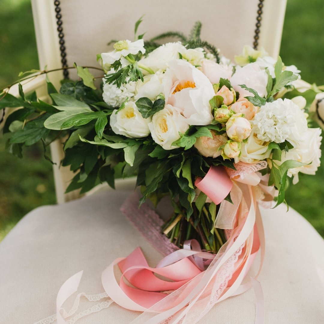 Cascading ribbons and delicate lace can elevate a bridal bouquet from beautiful to breathtaking.  When selecting adornments for your bouquet, consider the textures and colors that will complement your dress and wedding theme. The right details, like 