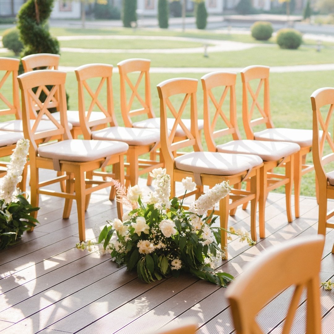 Every aisle deserves its own moment. These delicate aisle florals are more than just decoration, they're a prelude to the 'I dos'. This walkway is lined with nature's purest whites, setting the stage for a love as clear and bright as the promises mad