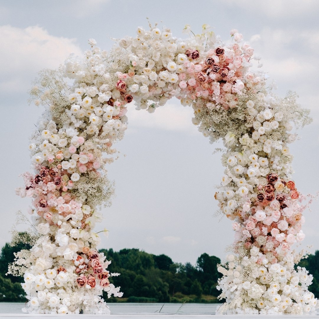Make a grand entrance with an exquisite floral arch that speaks volumes about your style. Perfectly crafted to complement your special day, each bloom is selected to create a stunning visual impact. Like what you see? Double tap if you would want thi