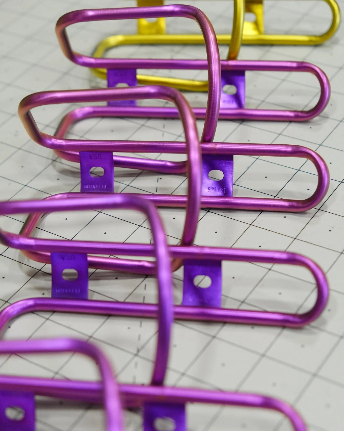 A lil run of violet King Cages on the bench last week ✨✨✨
.
.
.
#kingcage #titaniumanodizing #tibike #cycling #roadbike #mountainbike #mtb #gravelbike #tiano #titanium #anodizing #colorado #madeinusa