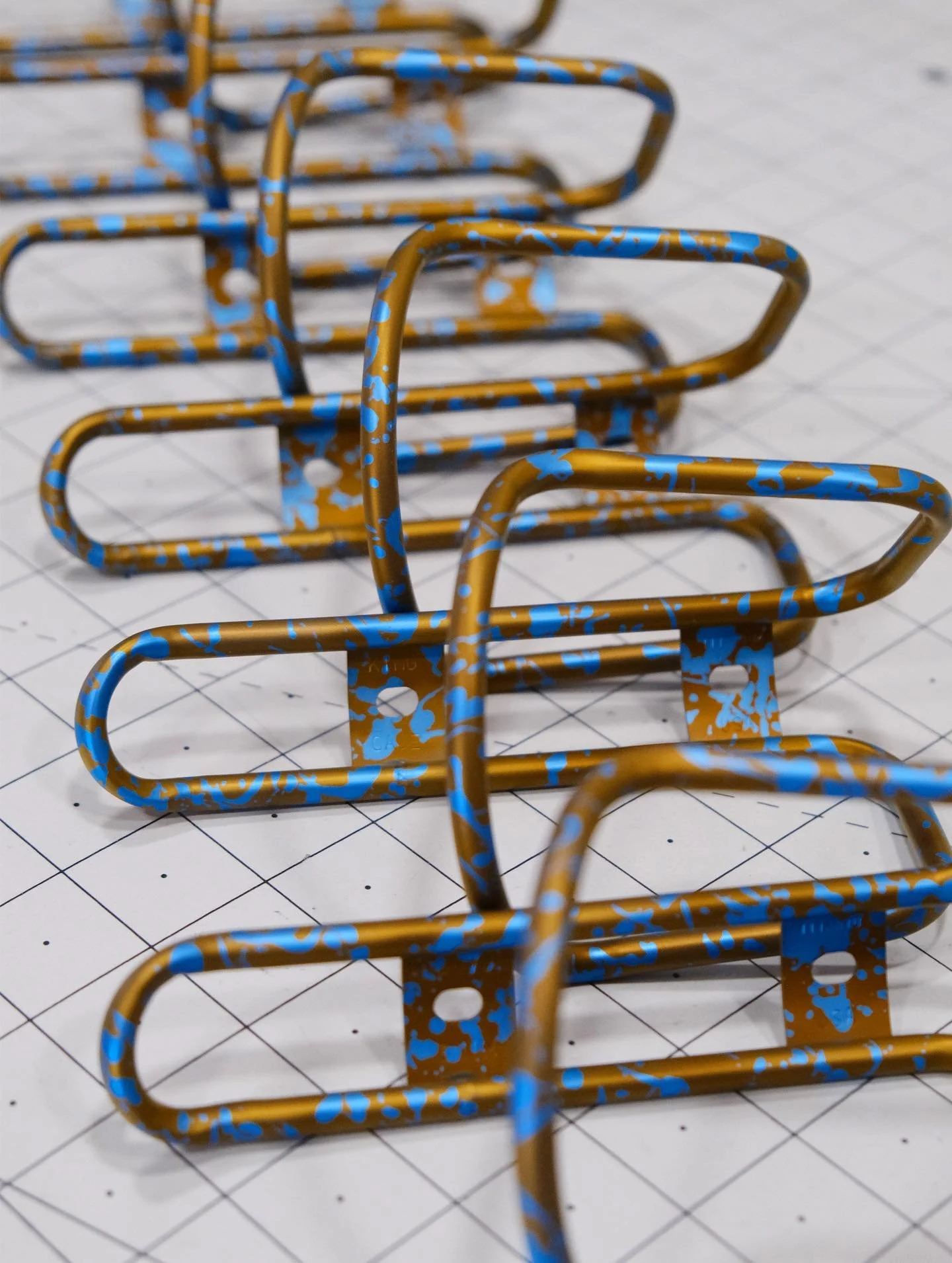 Splish splash here we go for Monday, popping some Splash splatter anodized ti King Cages into webstore inventory 💦
.
.
.
#kingcage #titaniumanodizing #tibike #madeinusa #titanium #anodizing #cycling #roadbike #mountainbike #gravelbike #noboringbikes