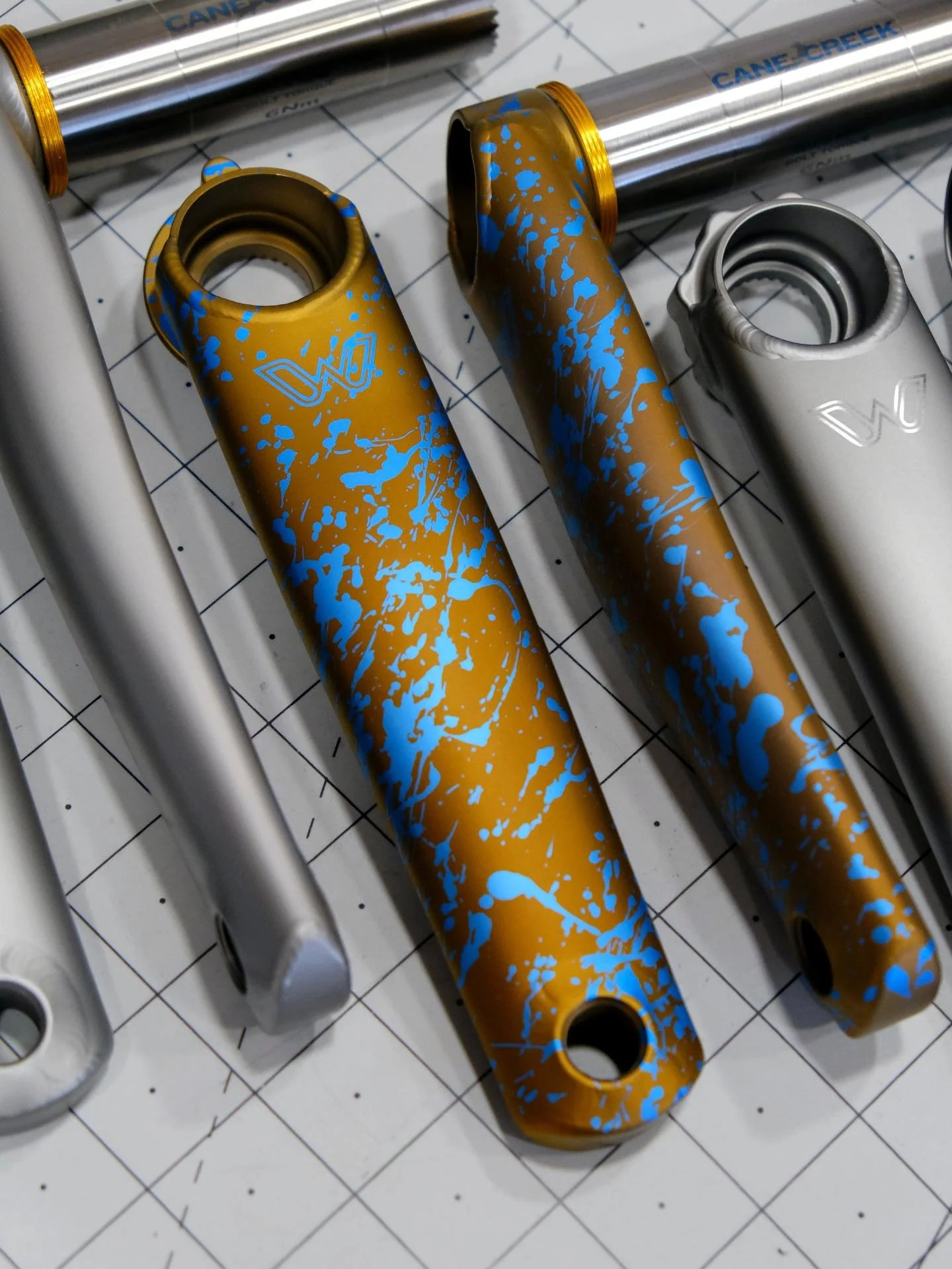 This very special splatter ano crankset, anodized to accompany Hiroshi&rsquo;s Splash build kit, came out beautifully.
.
.
.
#eewings #splatteranodized #titaniumanodizing #tibike #cycling #roadbike #mountainbike #gravelbike #brompton #noboringbikes #