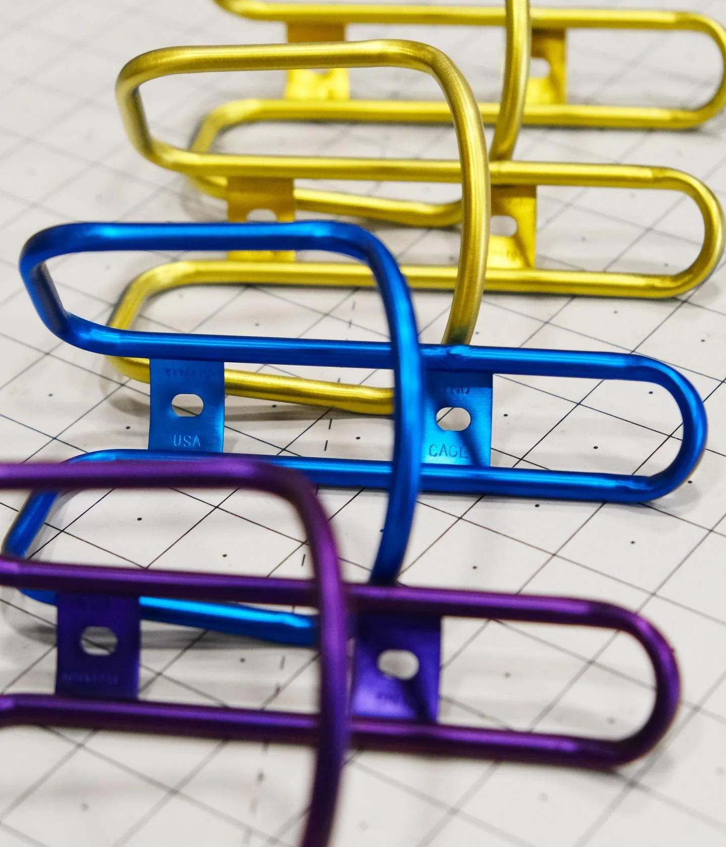 A snap of a few King Cages in varied colors on the bench from a few weeks ago. I love these deep blue and deep purple colors on the cages.