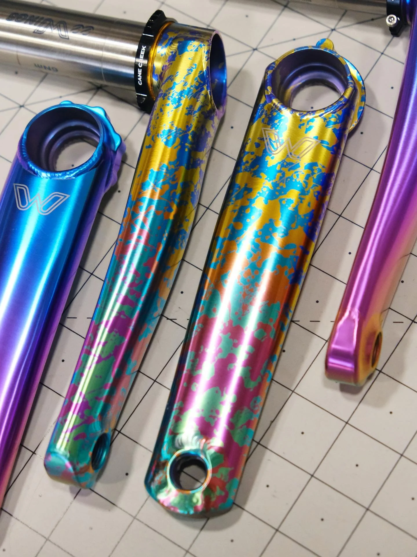 A set of 3-bolt eeWings in splatter ano working through last week. I&rsquo;ve still got a handful of these left, on sale in the Agave webstore while sizes last!
.
.
.
#titaniumanodizing #tibike #cycling #roadbike #mountainbike #mtb #gravelbike #slatt