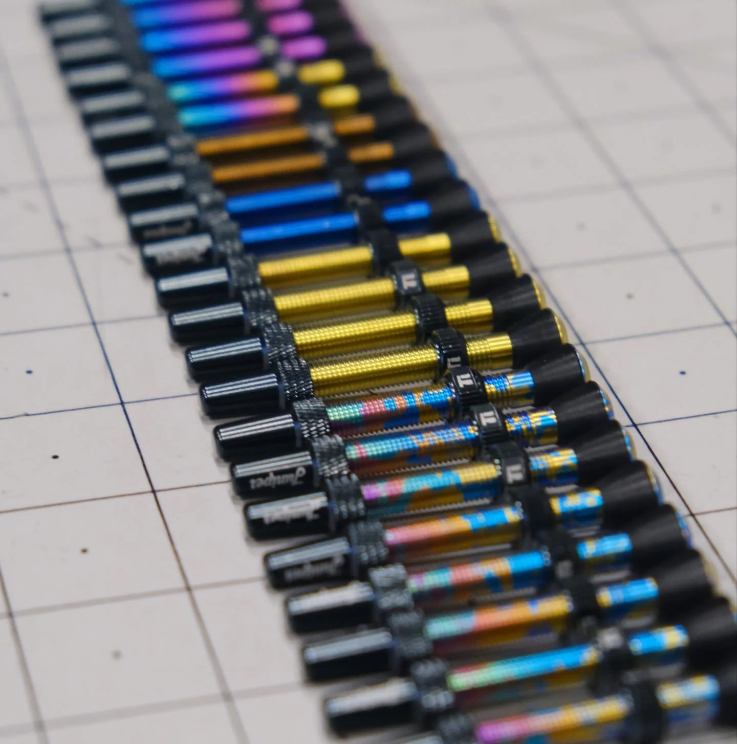 Valve stems on the march! A batch of Juniper ti valve stems in various anodized colors wandering down the bench recently ✨✨✨
.
.
.
#titaniumanodizing #tibike #cycling #custombicycle #mountainbike