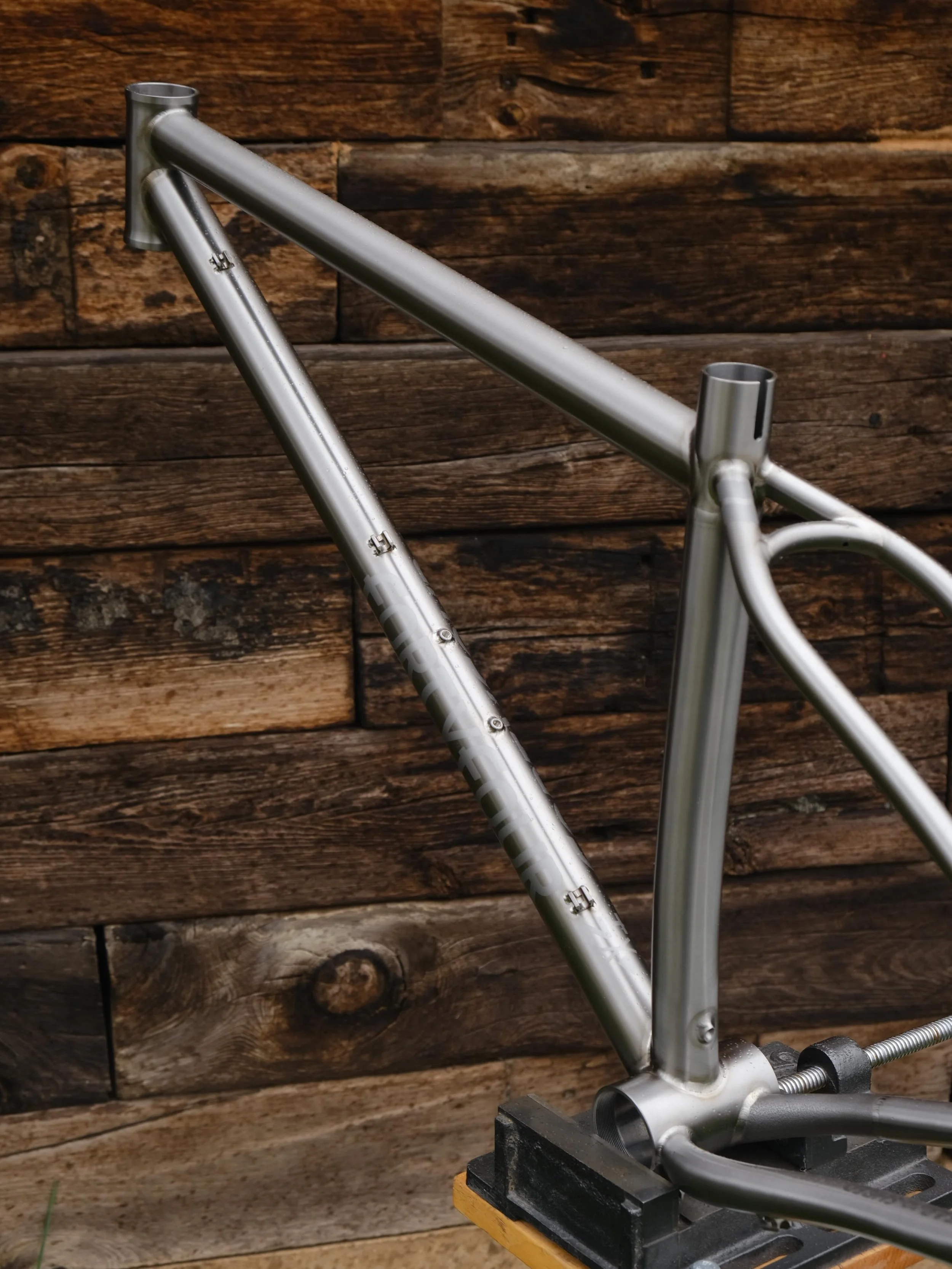 That&rsquo;s one clean machine: a @44bikes Huntsman in brushed raw ti, with a satin grey graphics package. That&rsquo;s just about as pleasant as a rainy spring day in the desert.
.
.
.
#tibike #madeinusa #cycling #colorado #custombicycle