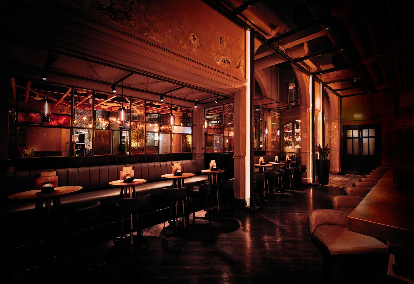 Alchemist, Nottingham fixed seating and decorative glazed screen.