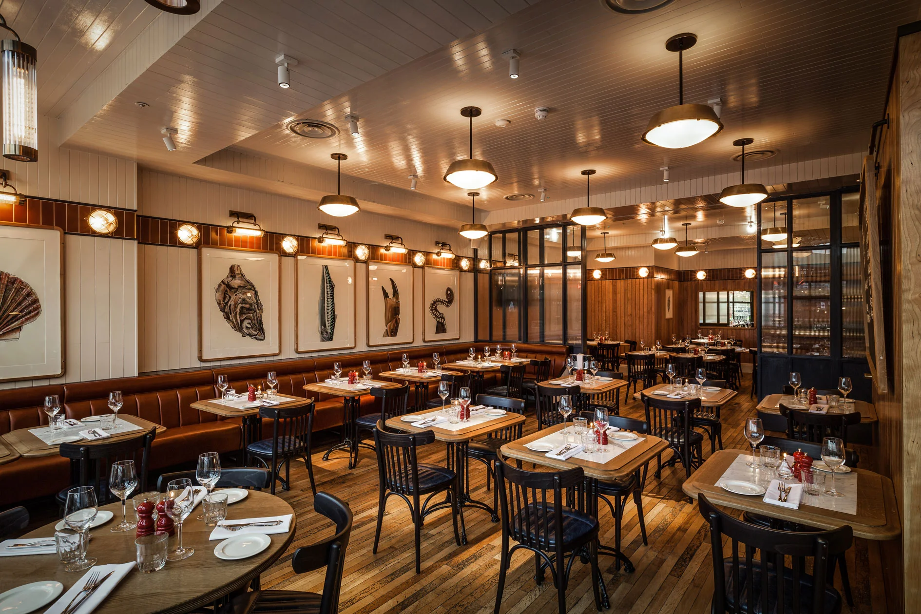 Wright Brothers restaurant with fixed seating and artwork