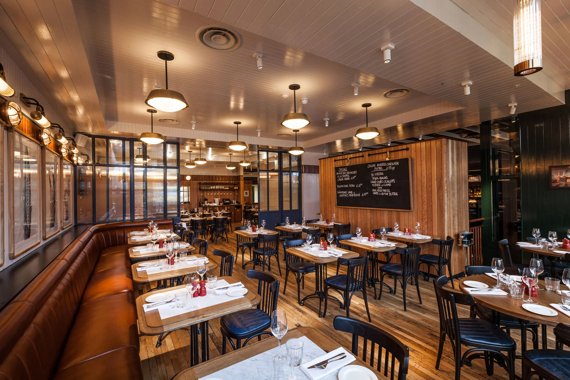 Wright Brothers restaurant with fixed seating and blackboard