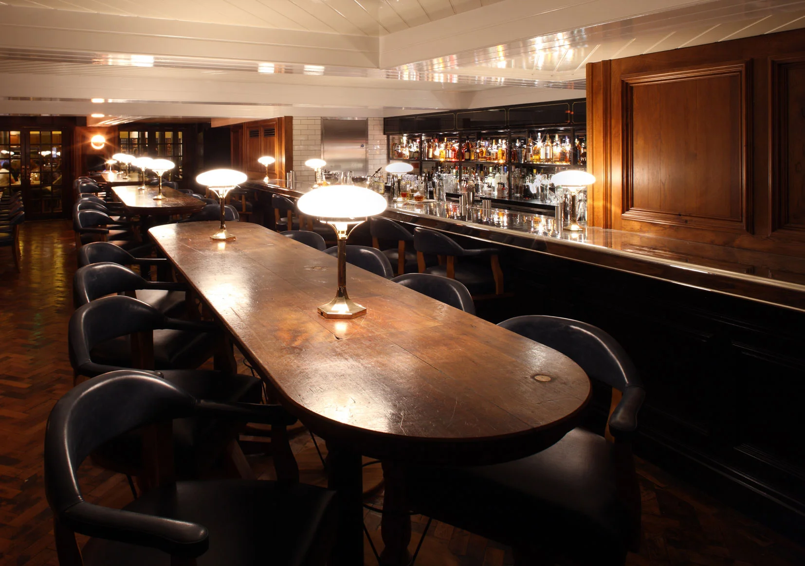 Hawksmoor, Seven Dials. Bar poseur tables with table lamps