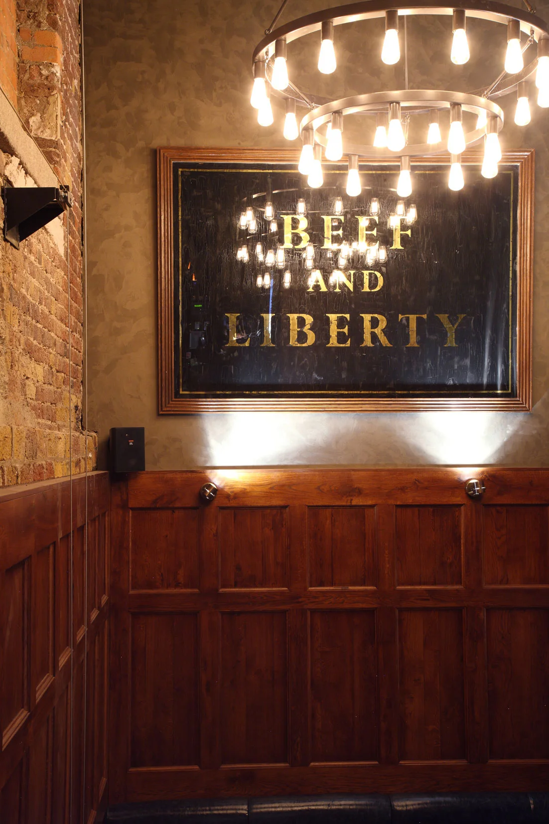 Hawksmoor, Seven Dials entrance. Bespoke Beef and Liberty sign
