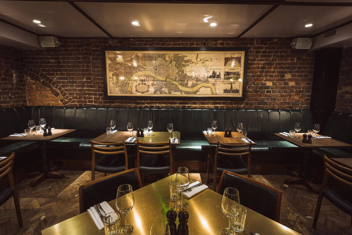 Hawksmoor fixed seating with Spitalfields map