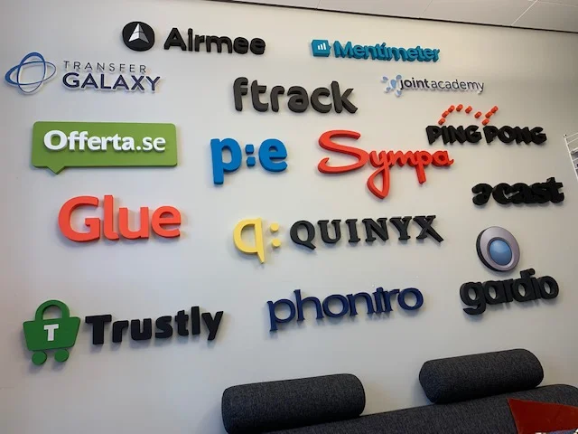 Alfvén & Didrikson’s office wall in Stockholm features the logos of its portfolio companies.
