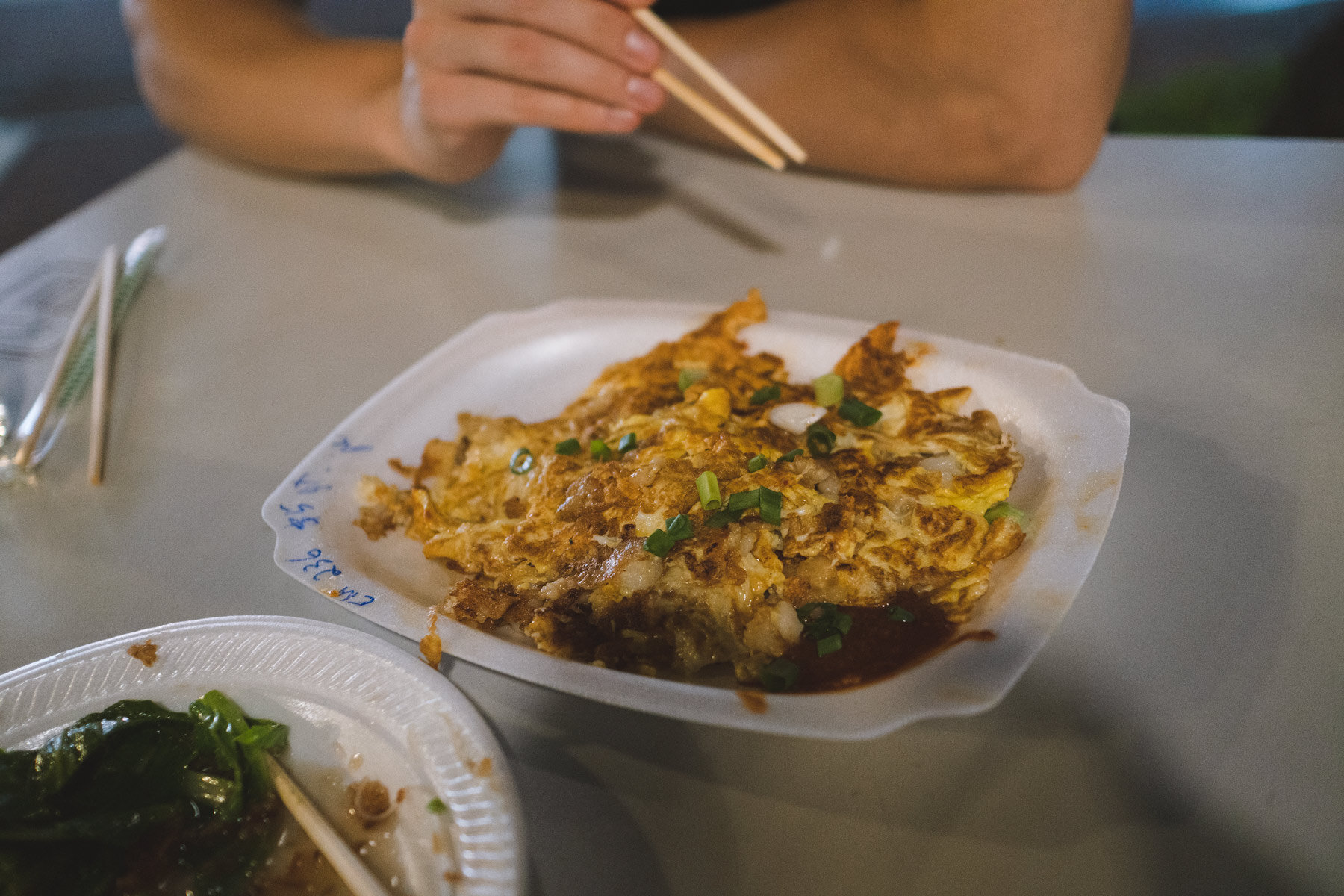 Hawker Food is good and cheap, but you will also eat from plastic dishes and with disposable chopsticks.