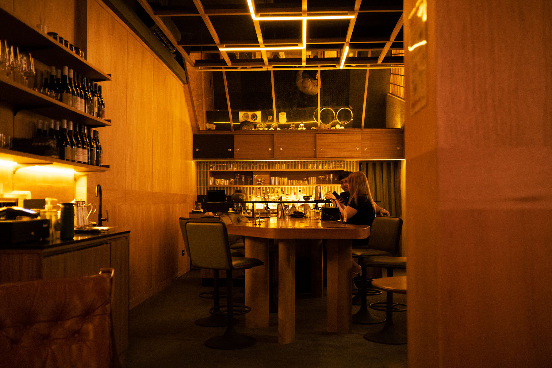 Live Twice welcomes guests to an intimate, cinematic cocktail bar inspired by Japan's mid-century modern era