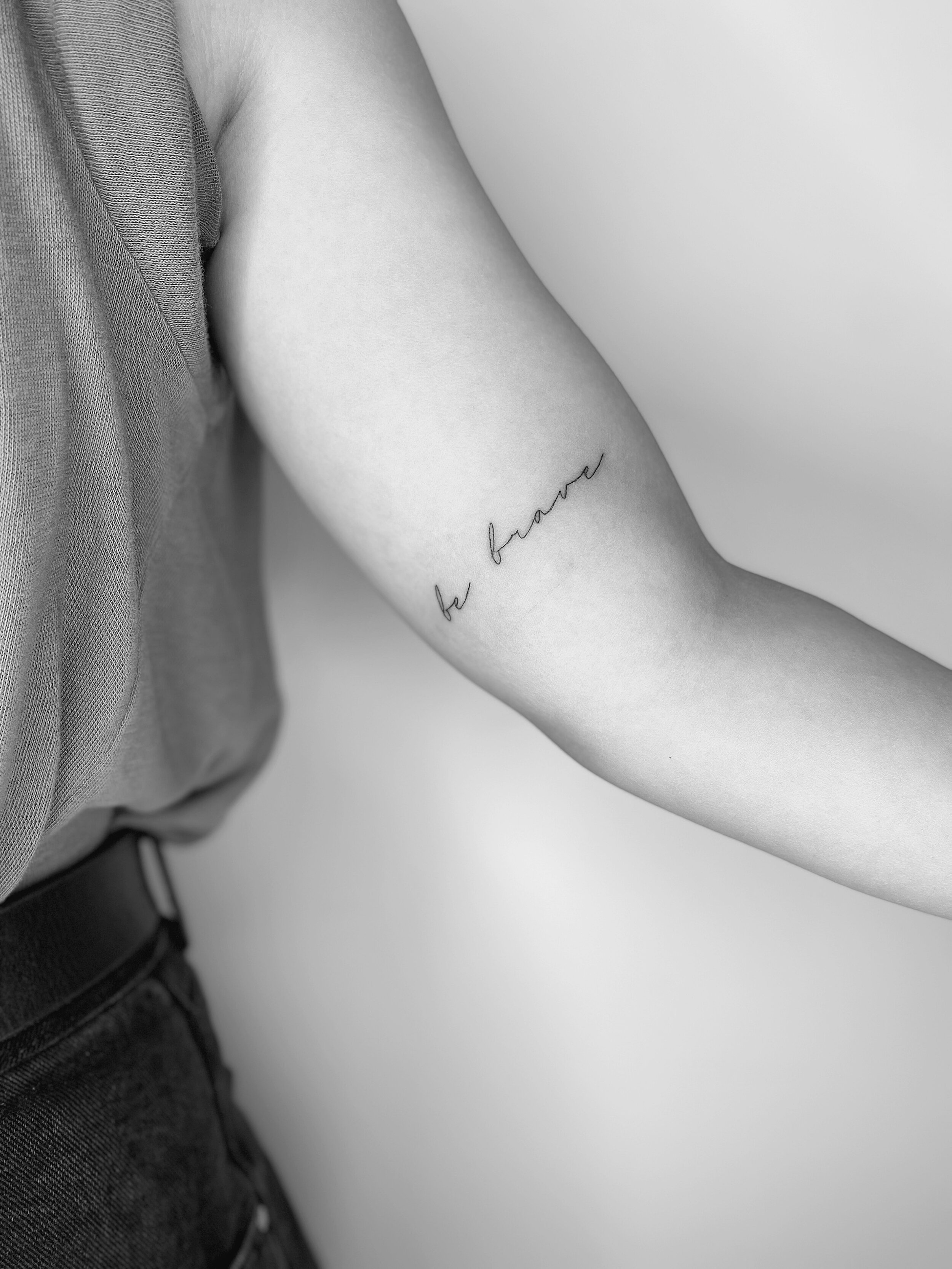 fine line script tattoo