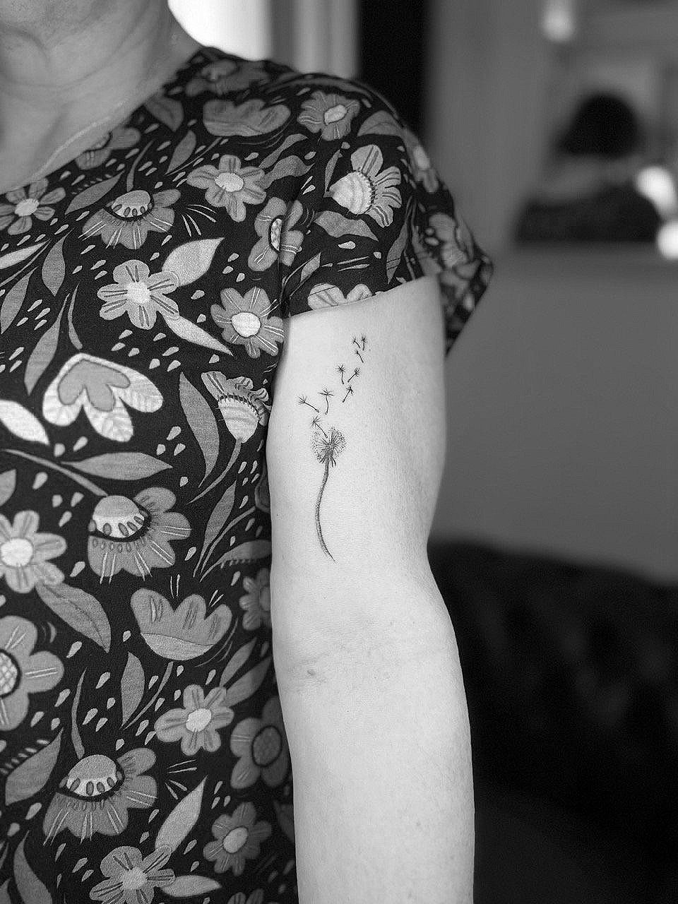 Fine line tattoo of dandelion by Math