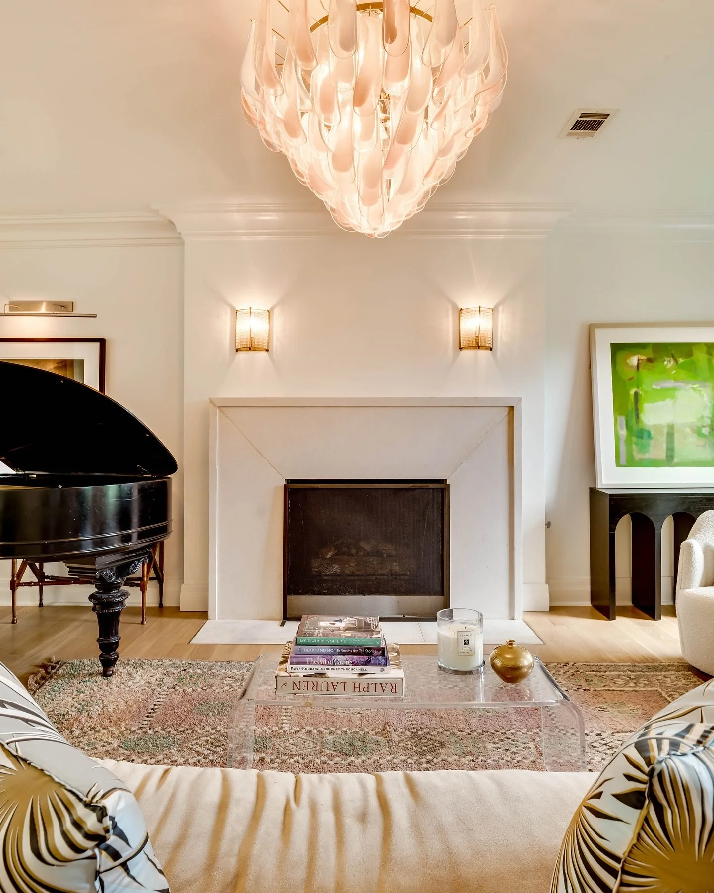 A chandelier that steals the show, a fireplace that sets the mood, and a beautiful open space that feels just right!
.
.
. 
Interiors: @ashby_collective 
.
.
.
#robertstephenhomes #custombuilder #customhome #austintexas #homebuilder #custom #78746 #a