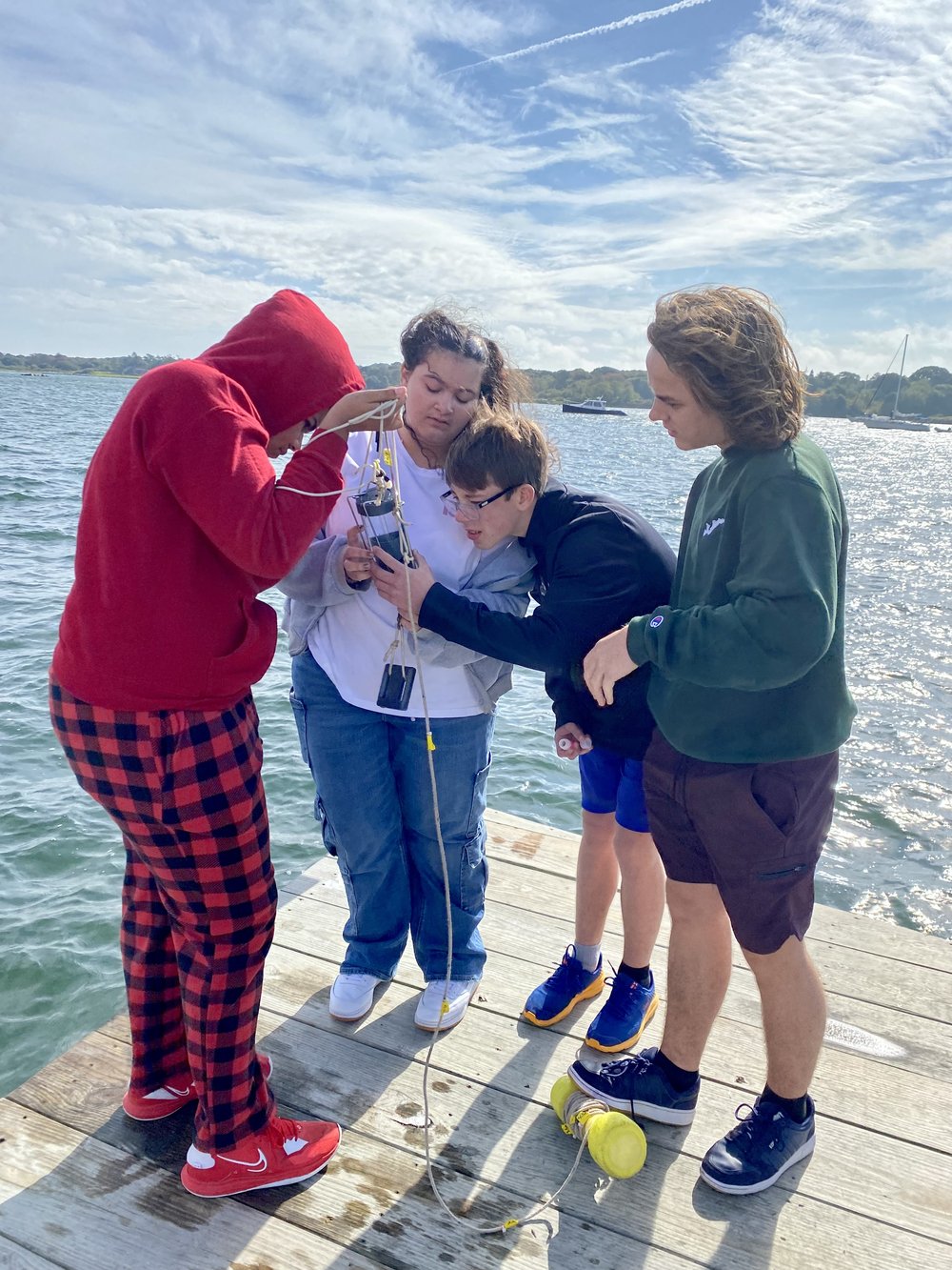 Fishers Island School class collecting water sample data