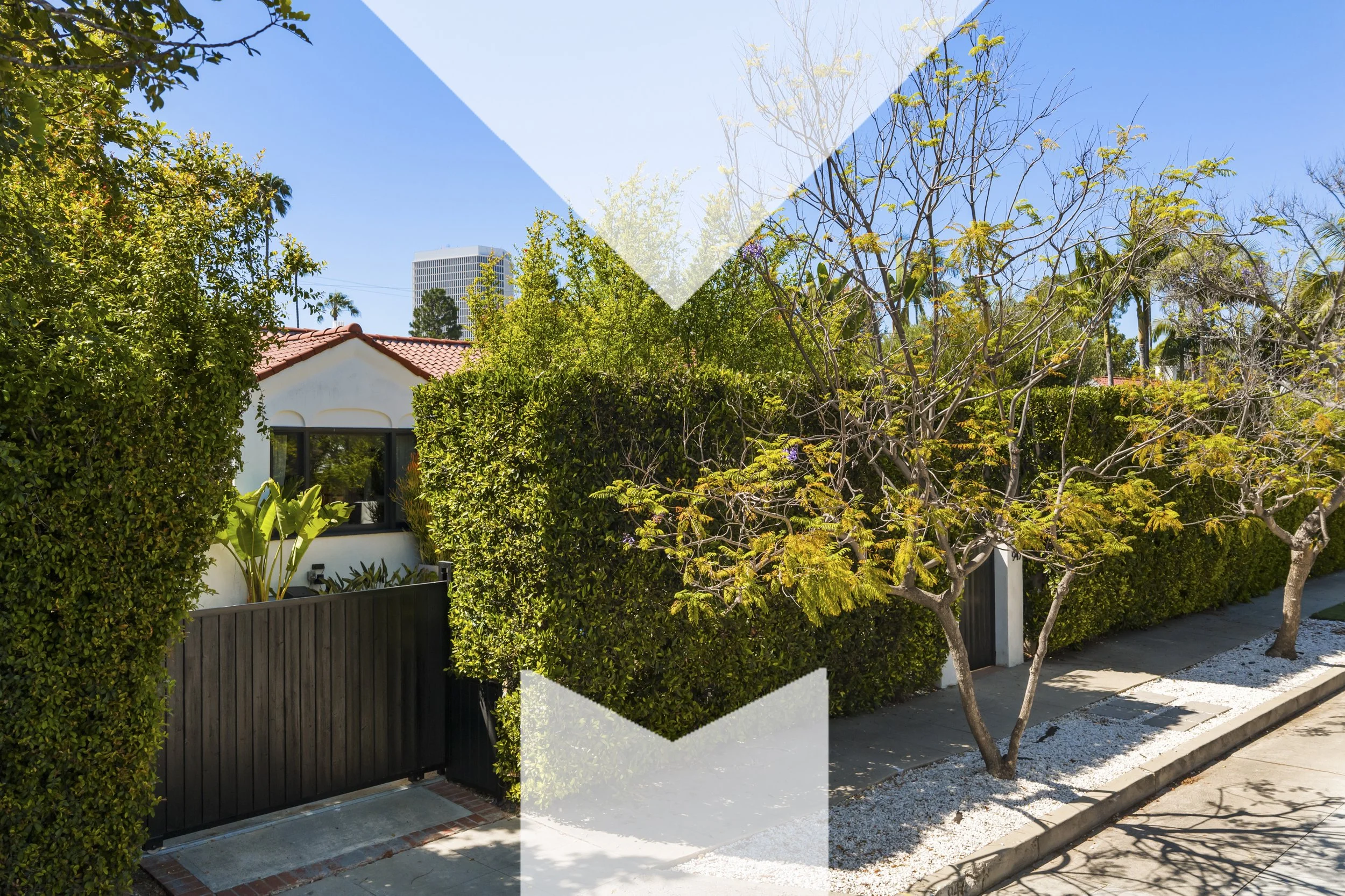 Missig Team represents 947 S Cloverdale Ave, Los Angeles, a Spanish home with immense style.