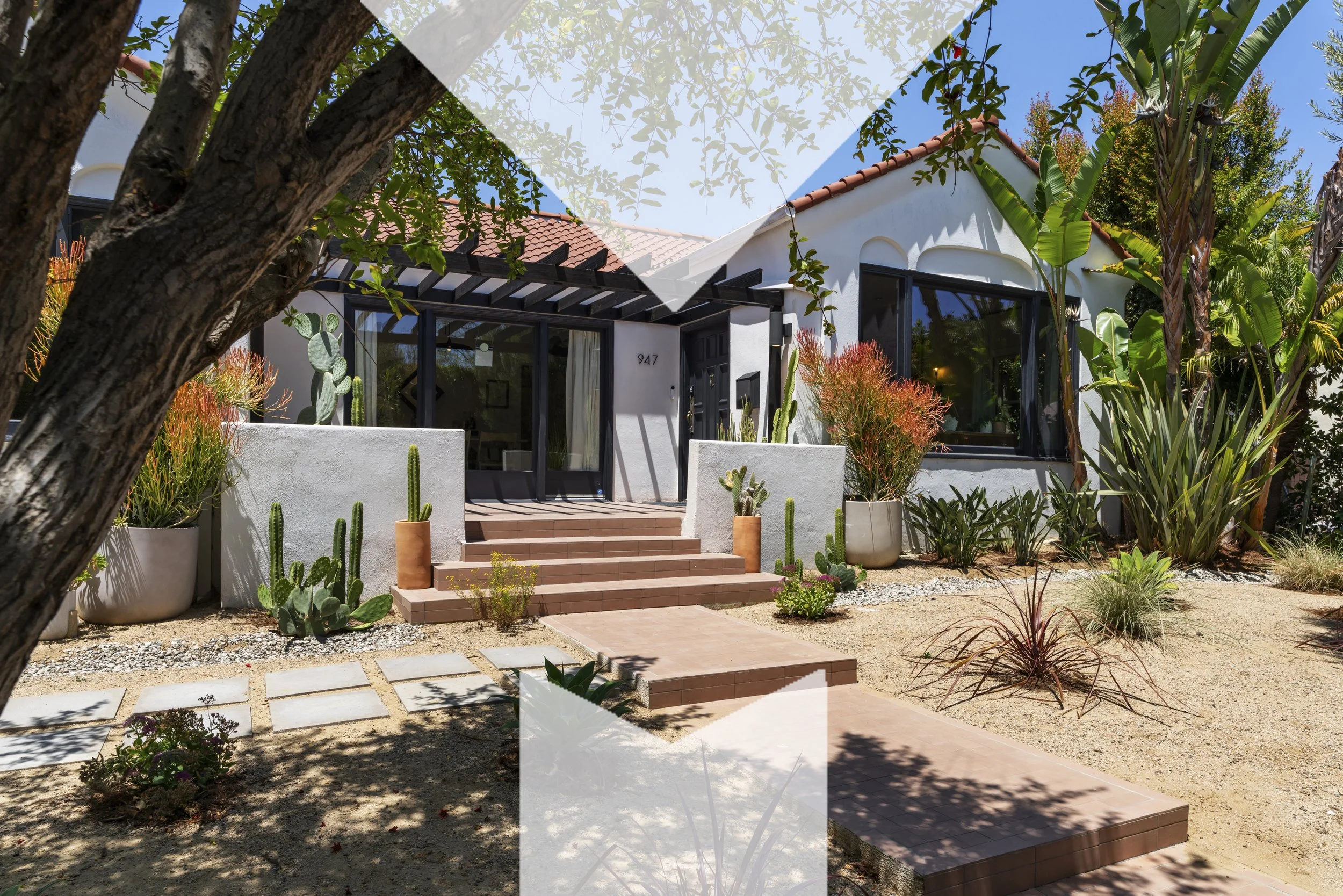 Missig Team represents 947 S Cloverdale Ave, Los Angeles, a Spanish home with immense style.