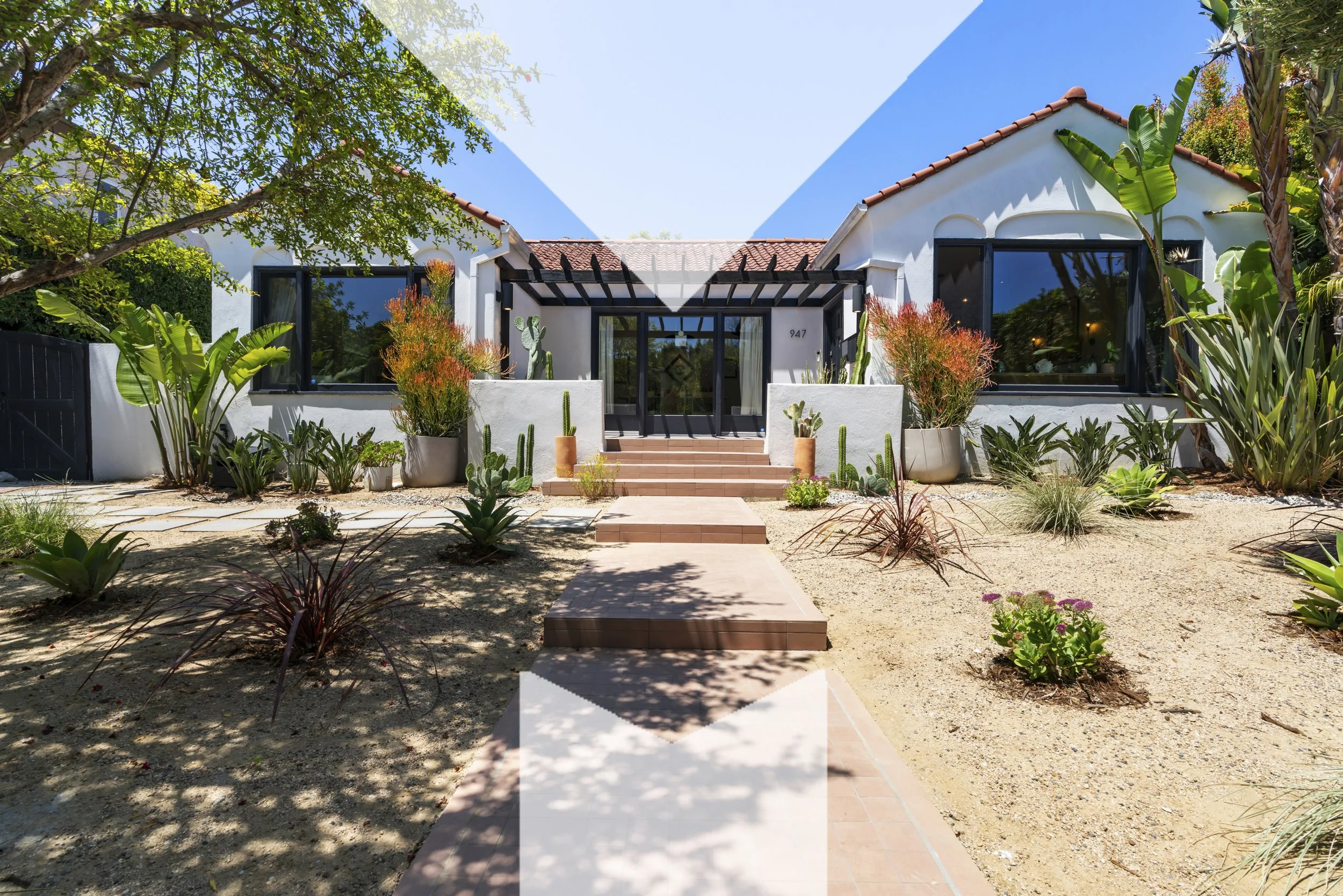 Missig Team represents 947 S Cloverdale Ave, Los Angeles, a Spanish home with immense style.