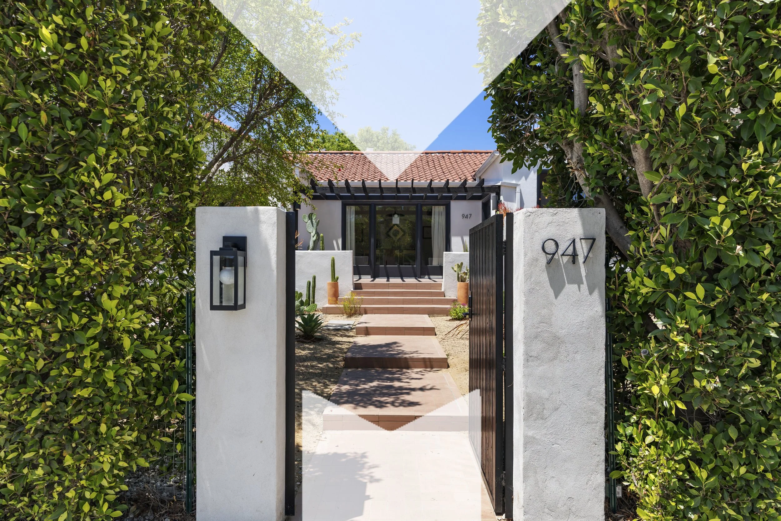 Missig Team represents 947 S Cloverdale Ave, Los Angeles, a Spanish home with immense style.