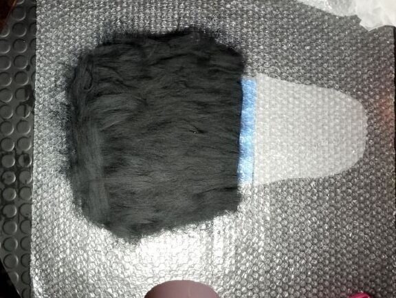 Four layer laid out on the front-side of bag . 