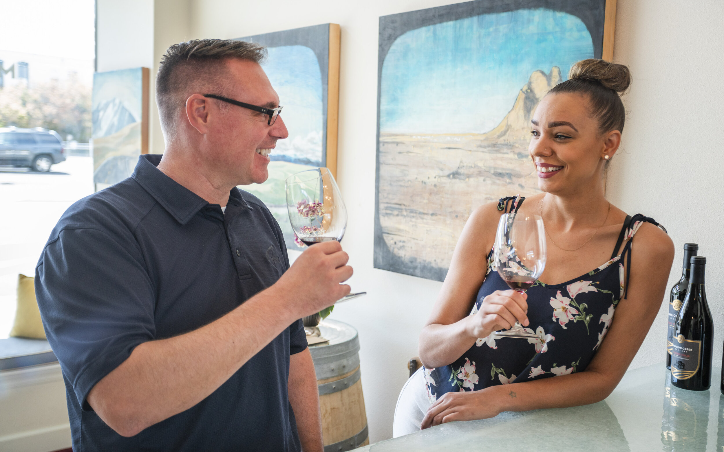 A pair of happy visitors to the Mansion Creek Cellars tasting room