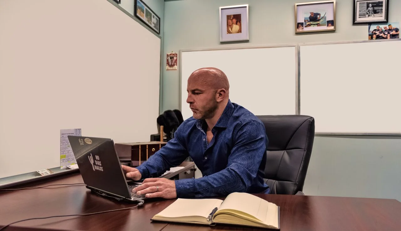 Kevin Kuly at Desk.jpg