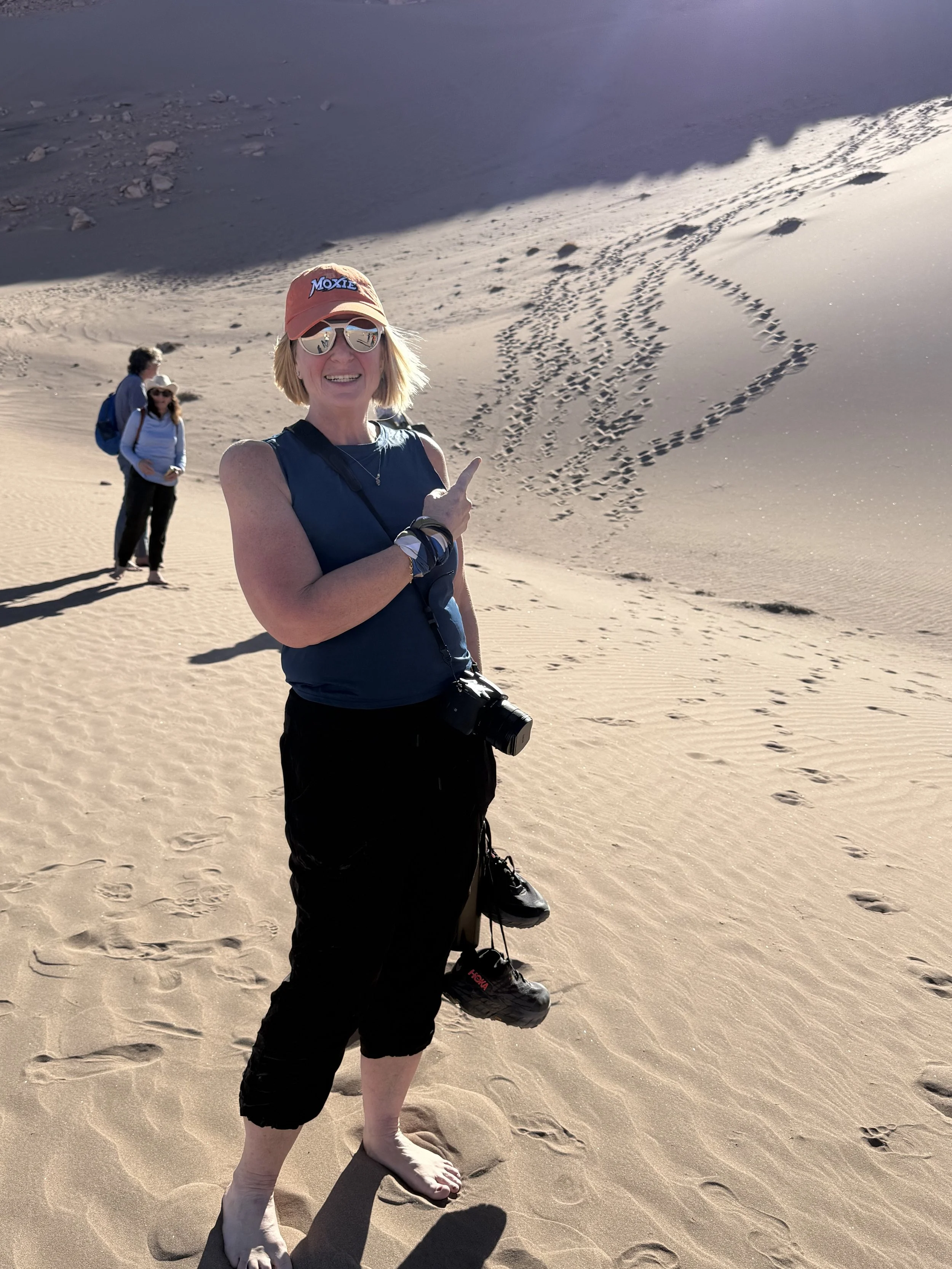 A smile because I just traversed the sand dunes