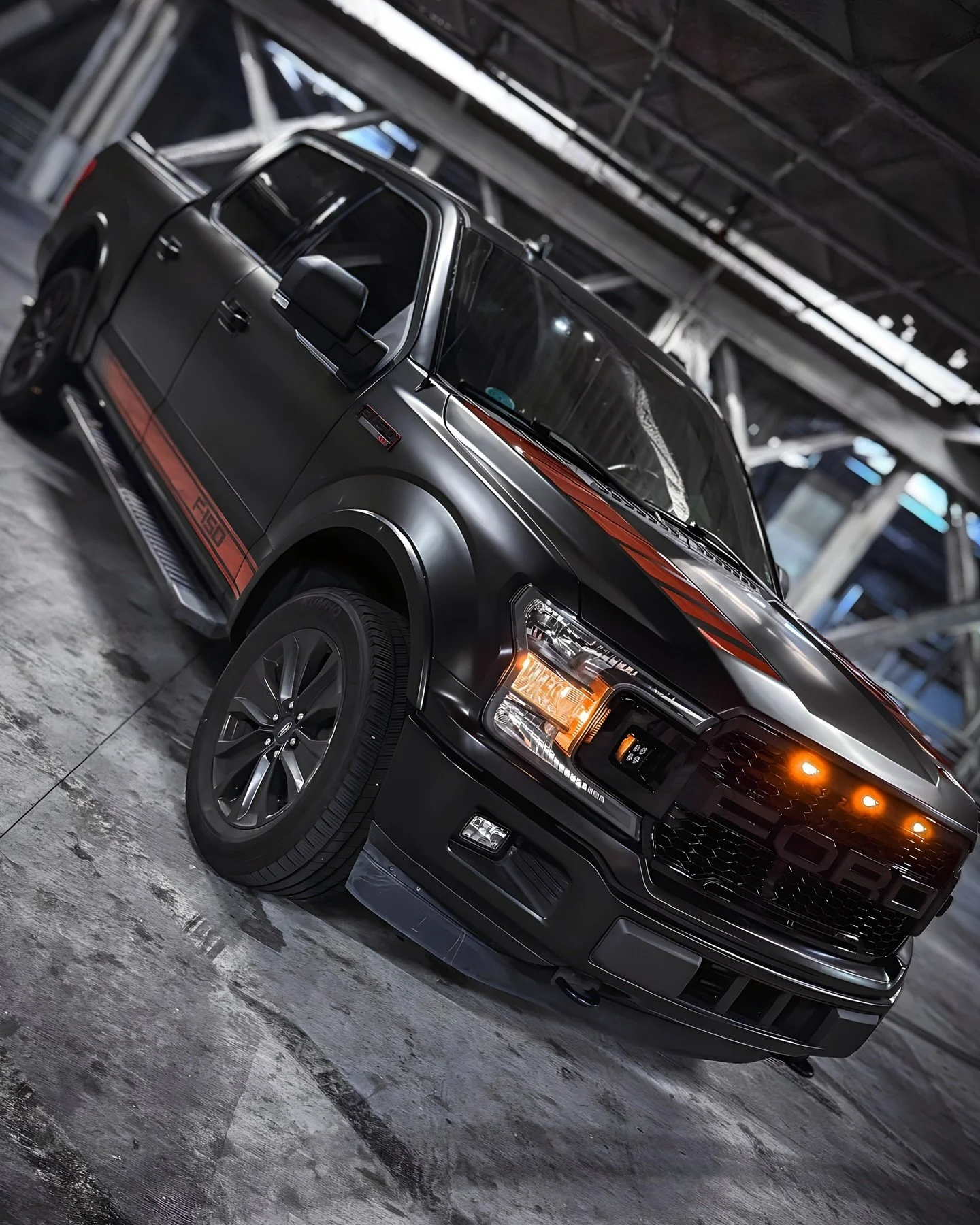 F150 wrapped in Avery Satin Black w/ Gloss Red graphics and a custom FORD raptor style grill installed w/ off road lights. #mobileservice #mobilewraps #thewrapdistrict #thewrapdistrictla #vinylwrap #wrapped #paintisdead #southbay #sanfernandovalley #