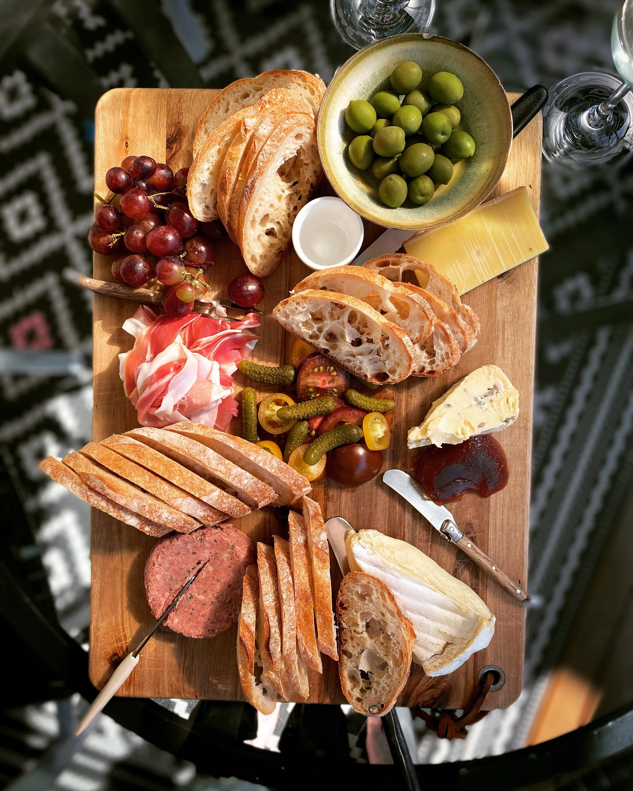charcuterie board with sourdough and all tasty things