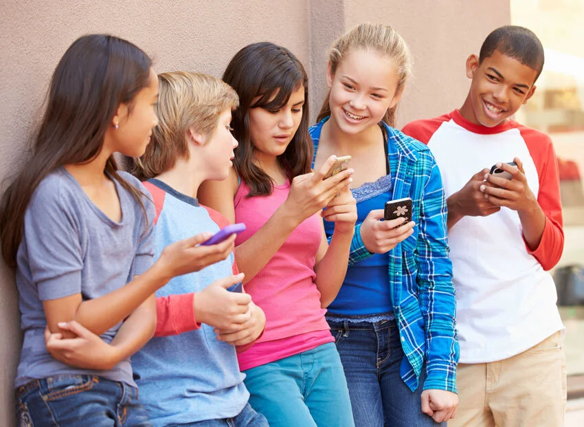 Children-using-mobile-phone-(High).jpg