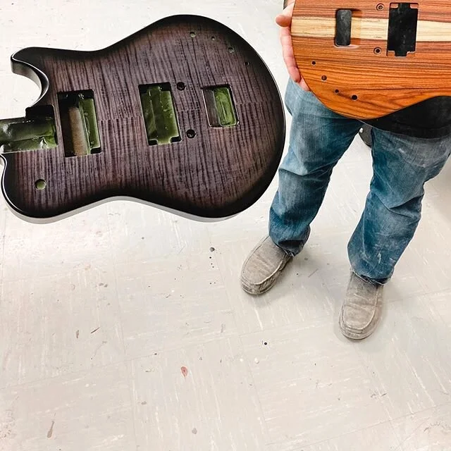 Man, we just love making our guitars.

Here’s another behind-the-scenes look at the hands-on, quality craftmanship behind the Ascender. We have placeholders drilled for our coil split switches, stacked tone and volume knobs, Seymour Duncan ‘59 neck and bridge pick-ups, and a pick-up selector. The cavity at the bottom of the body is where the strings pass through to the back of the body. 🛠

Also... did you know that each guitar is plek'd in cooperation with Glaser Instruments in Nashville?
⠀⠀⠀⠀⠀⠀⠀⠀⠀
#nashvillemade #nashville #ciarination #theascender #innovation #innovativeproducts #startup #guitarsofinstagram #guitarstagram #guitars #guitar #guitarsdaily #guitarplayer #guitarist #music #electricguitar #travel #travelguitar #getplekd #plekplayers #plekmachine #plekeverything #bosswazaair #NeuralDSP #strymon #quilterlabs #electroharmonix #hughesandkettner #revvamps