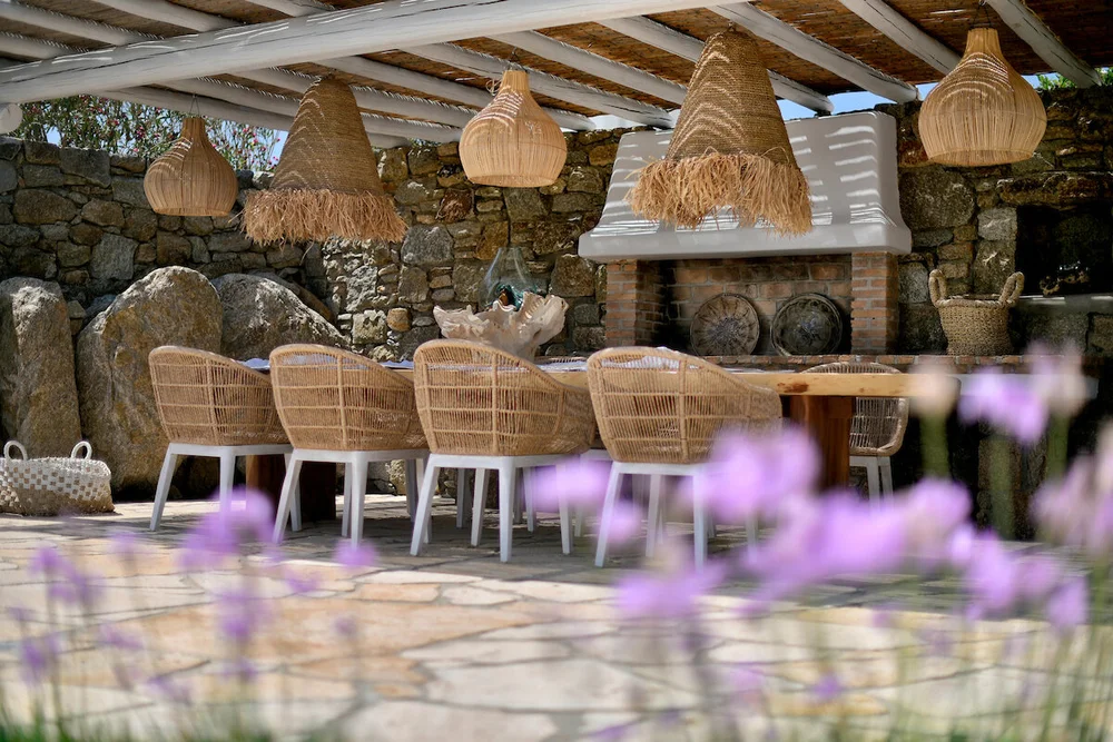 Stone-walled outdoor dining area at Villa Rea