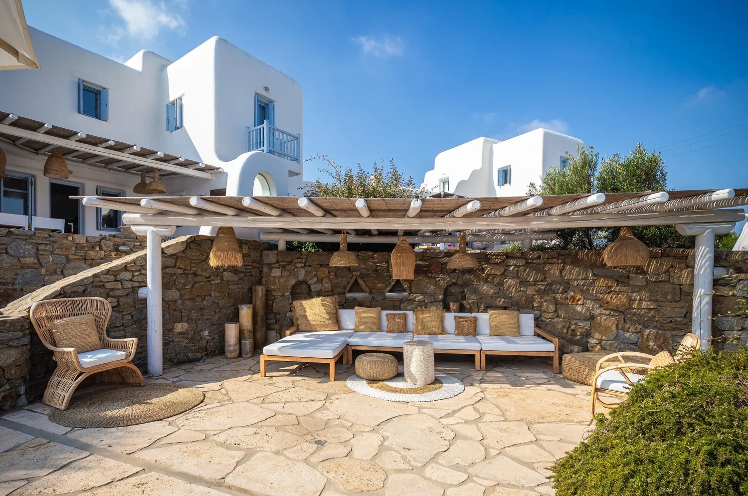 Shaded lounge by the pool at Villa Lito and Villa Artemis