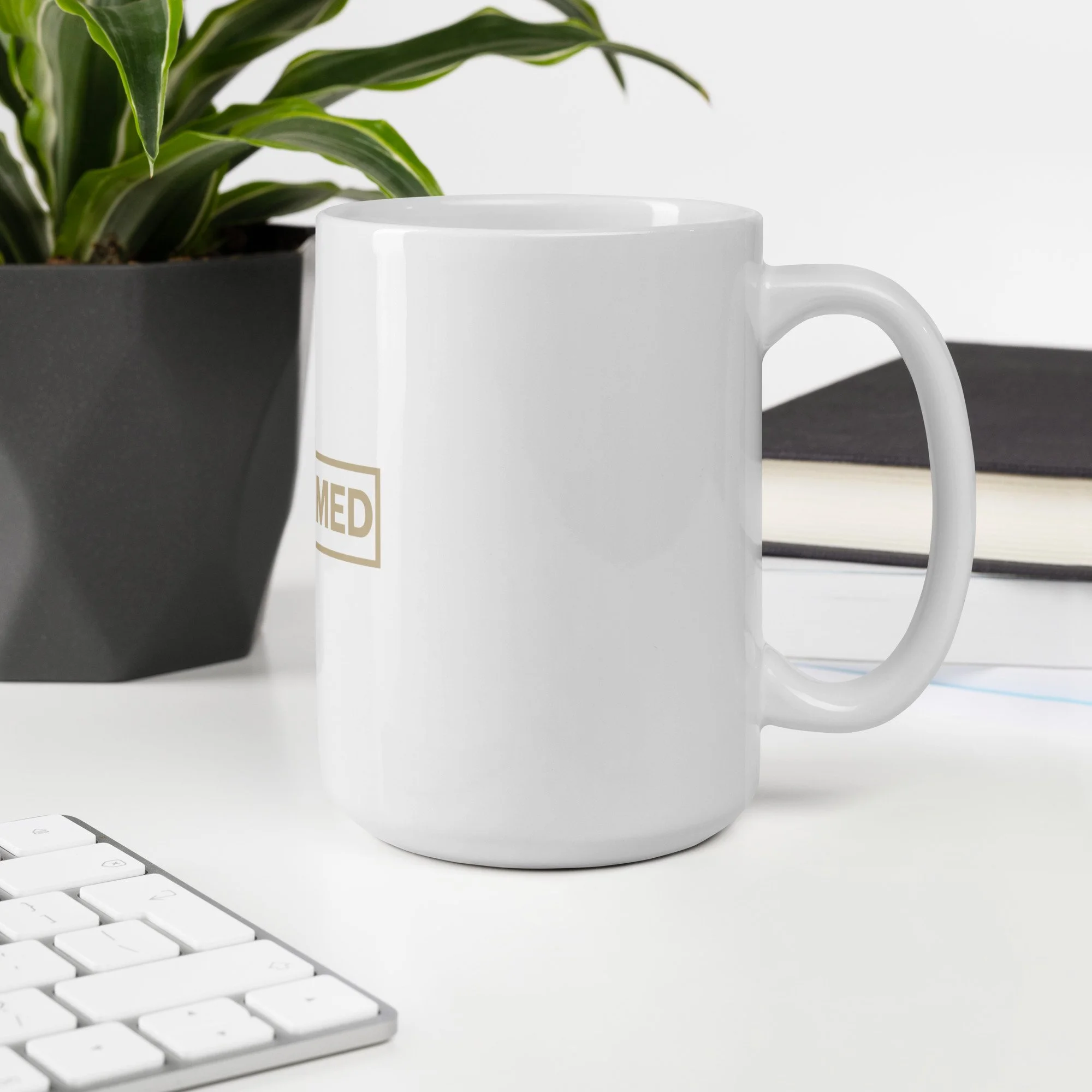 white-glossy-mug-white-15-oz-office-environment-692f1ecd3179a.jpg