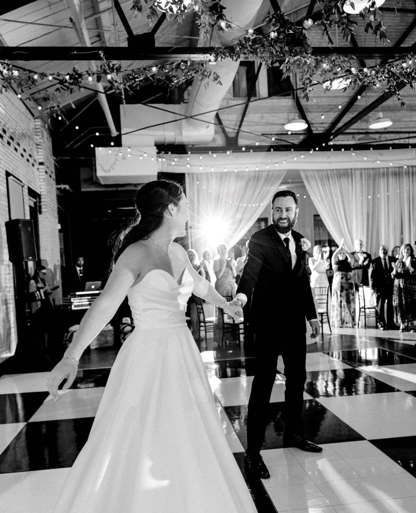 First Dance Friday for Courtney &amp; Elliot 🖤🤍⁠
⁠
&bull;⁠
&bull;⁠
&bull;⁠
⁠
Planning &bull; yours truly @somethingfabulousweddings ⁠
Venue, Catering &amp; Bar &bull; @markethall1914⁠
Photographer &bull; @behindthelensphotographync⁠
Flowers &bull; 