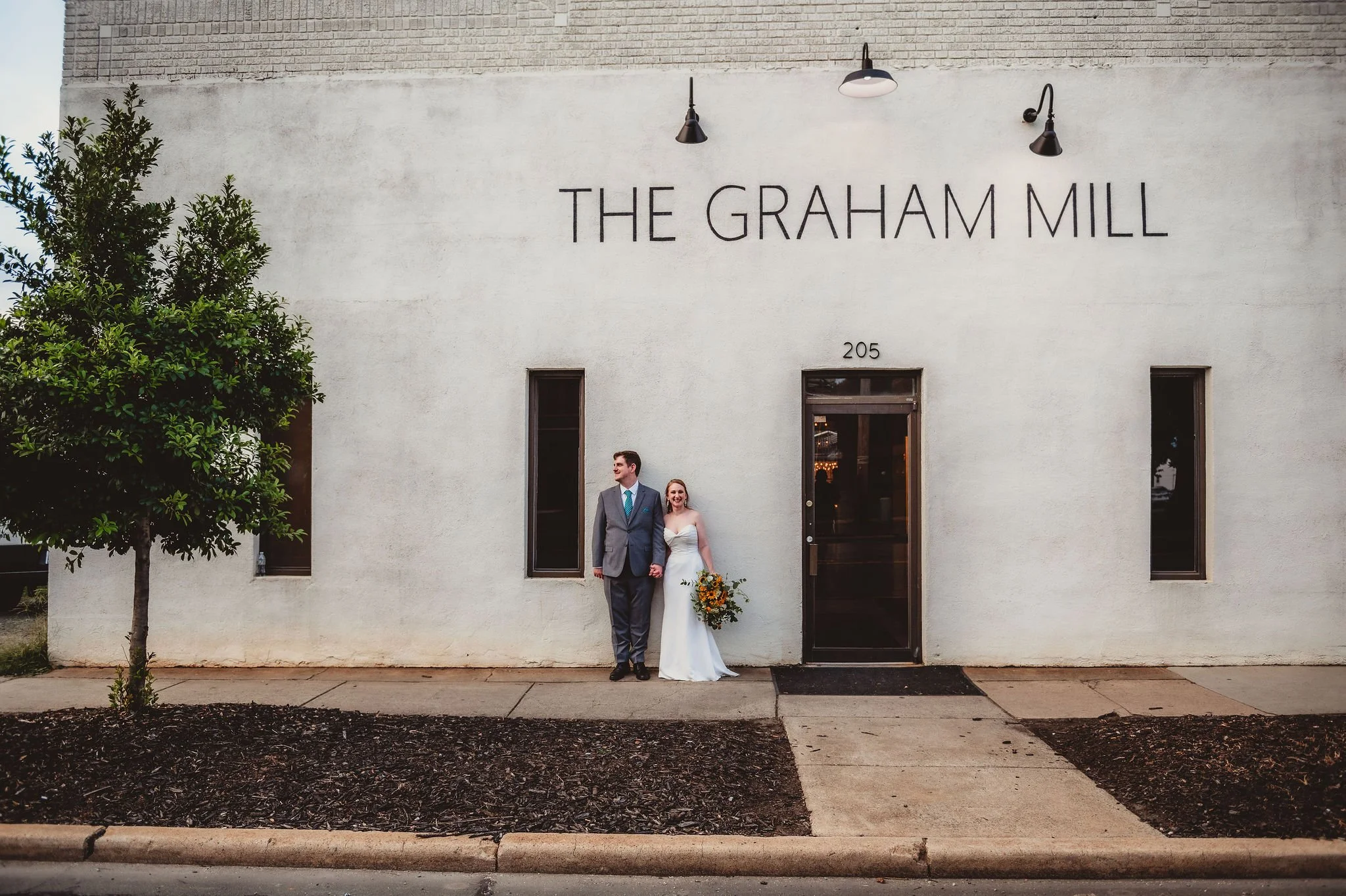 The_Graham_Mill_Wedding_front_door_couple.jpg