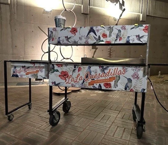 The perfect wedding cocktail hour addition: a manned "LaLa Quesadillas" cart station at a modern Palm Springs museum venue. This boutique mobile station features an artisan design and professional grill for serving guests during the reception.