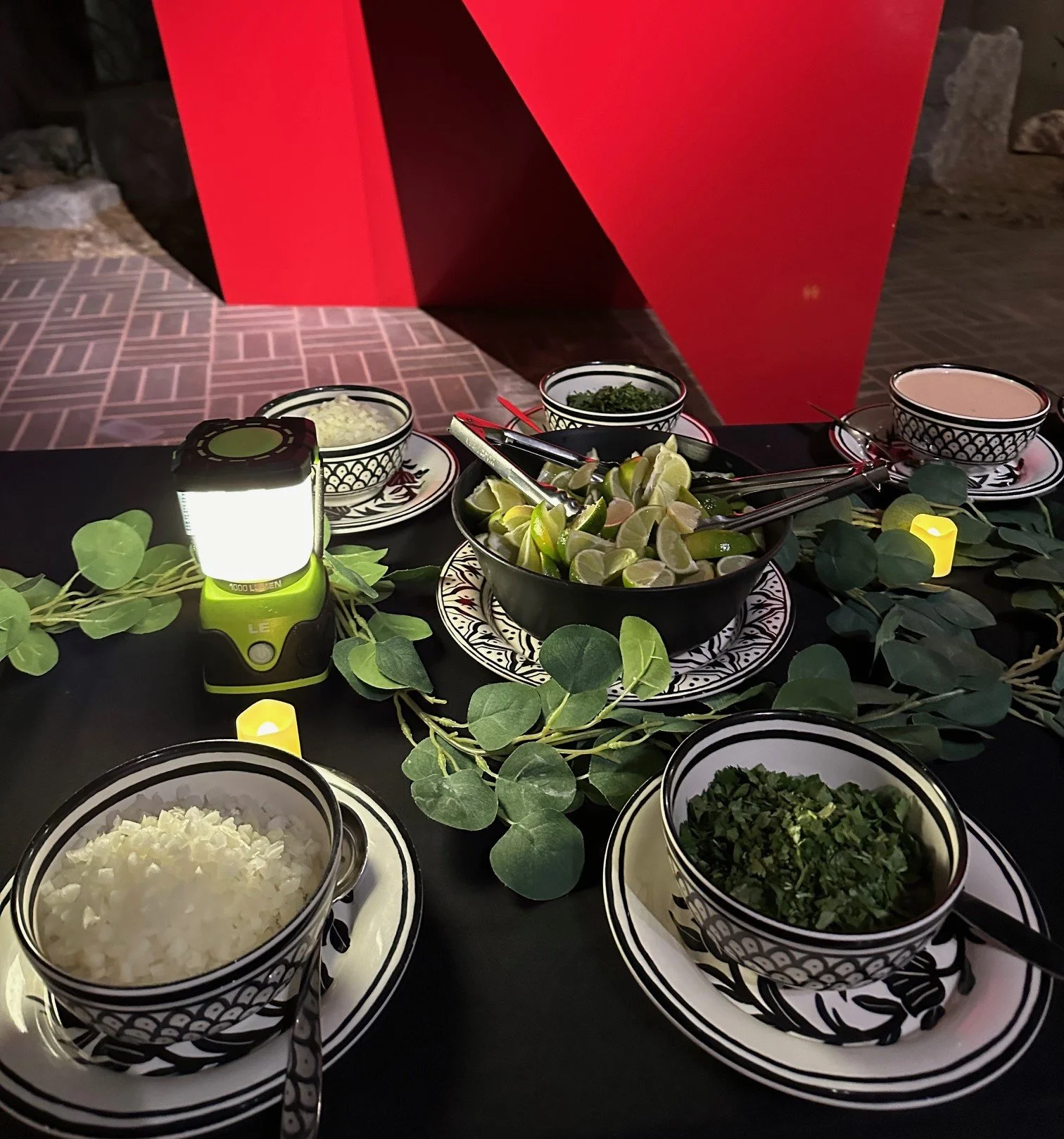 Premium taco bar condiment station catered for a private estate vacation rental wedding in Palm Springs with gluten free choices