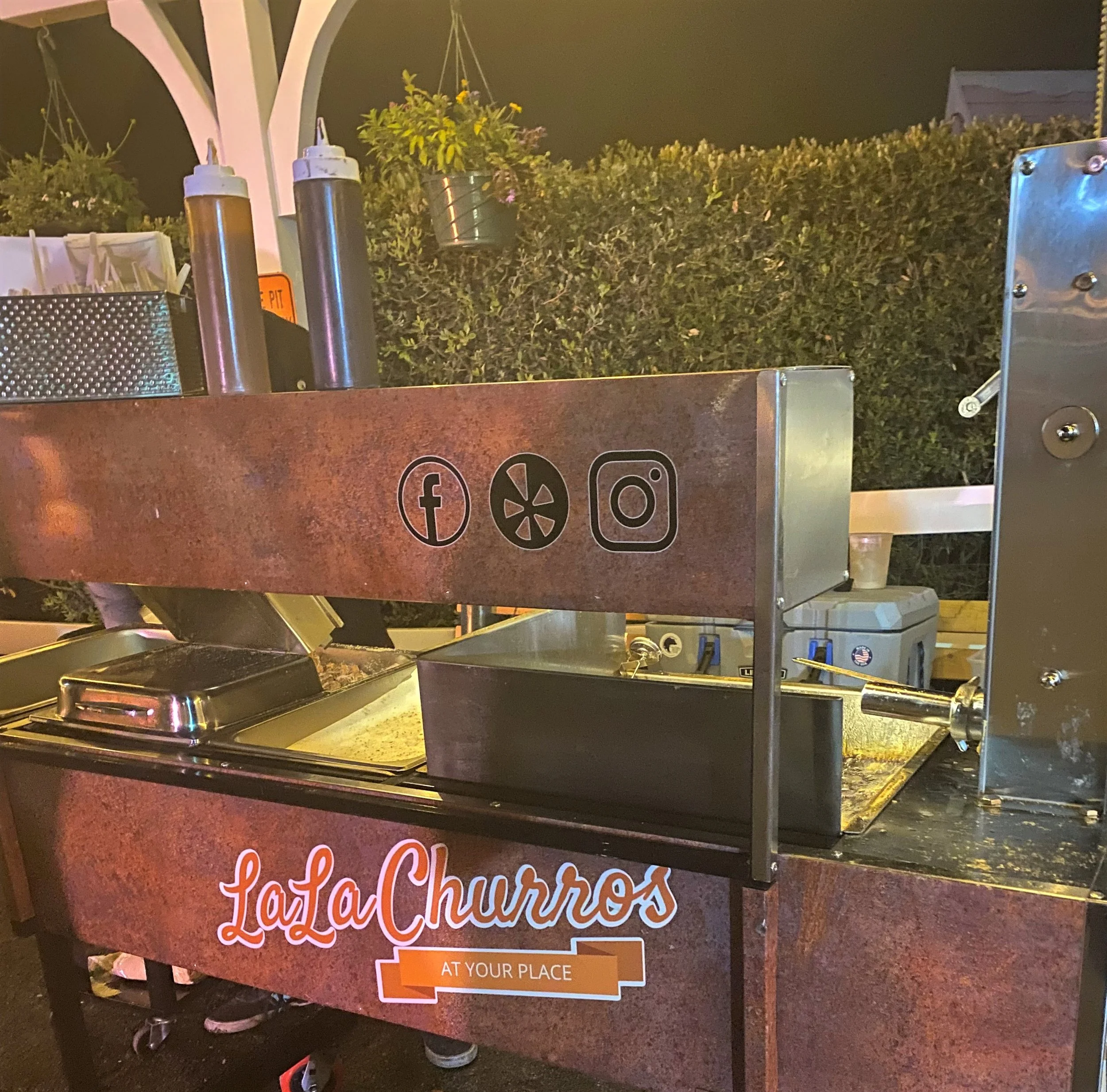 LaLa Churros live churro catering station at Tivoli Italian Villa in Fallbrook serving fresh-made churros for a wedding reception.